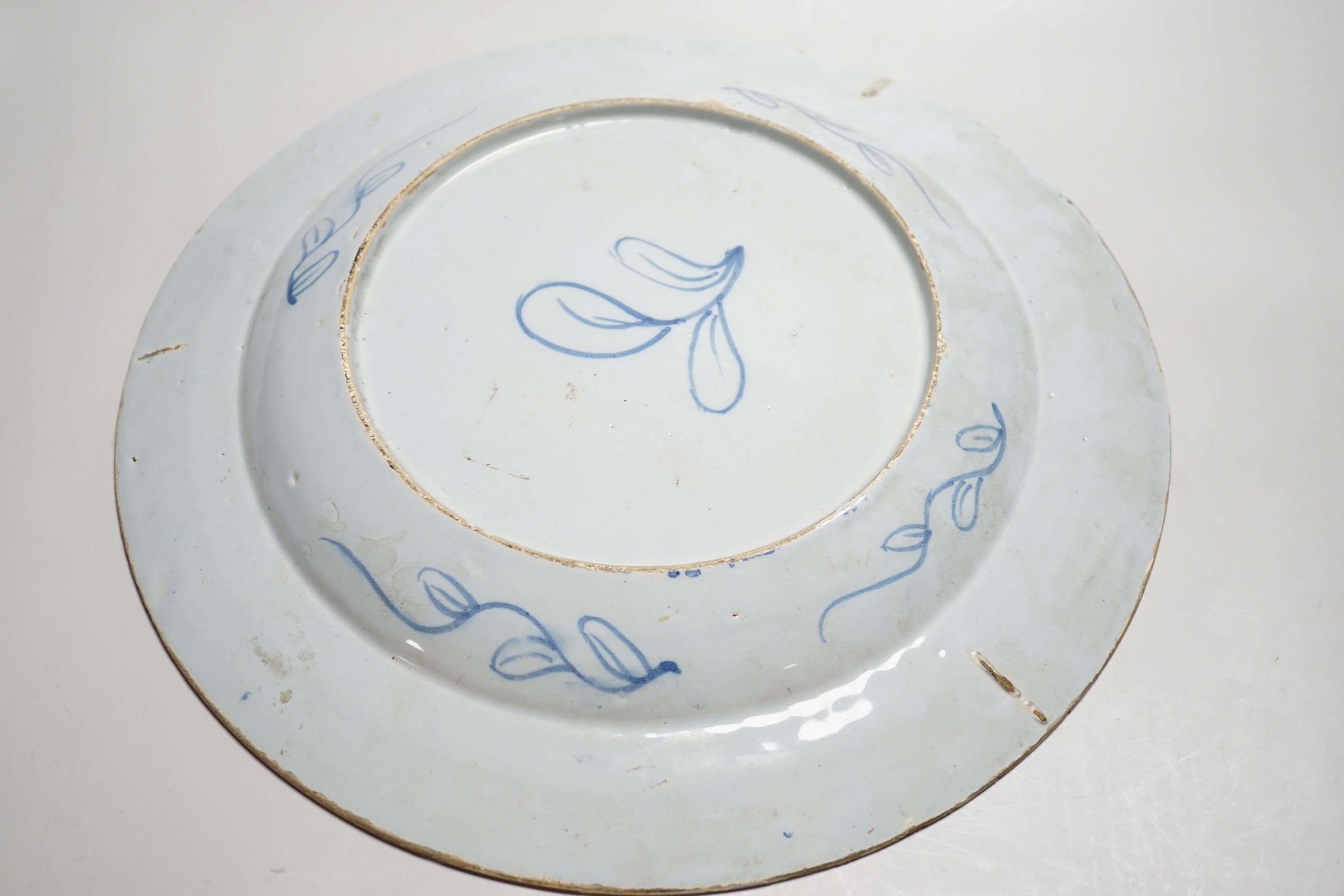 An 18th century Delft chinoiserie charger, 36cm diameter